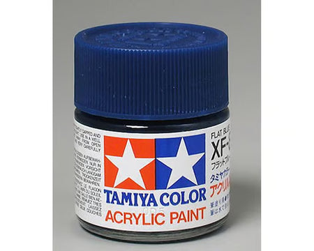 Tamiya Color acrylic paint jar with blue lid on a gray background