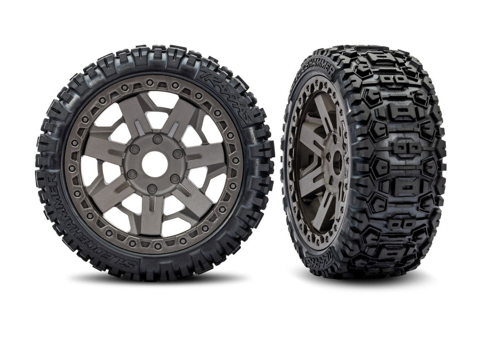 Two off-road tires with tread patterns on a white background, featuring the 'Belted' brand logo.