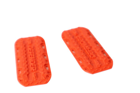 Two orange rectangular objects on a white background