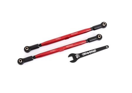 Two red aluminum toe links with black ends and a black aluminum wrench, labeled with '7075-T6' and 'TRAXXAS' branding.
